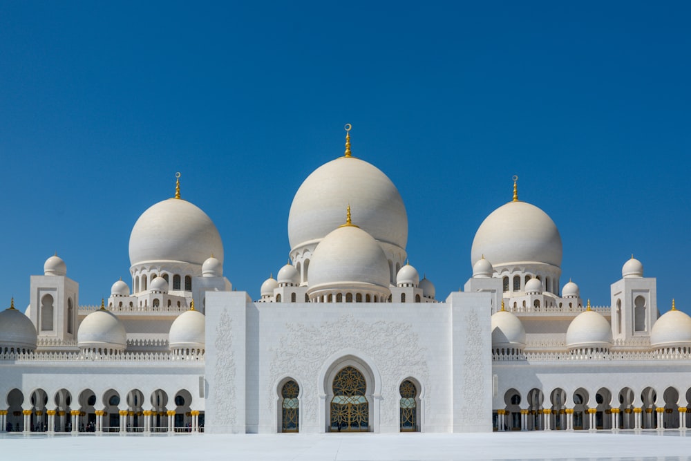 white and brown dome building under blue sky during daytime