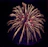 Close-up of vibrant red and gold fireworks bursting against a dark night sky.