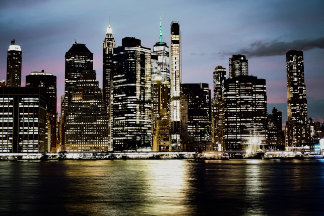 city skyline during night time