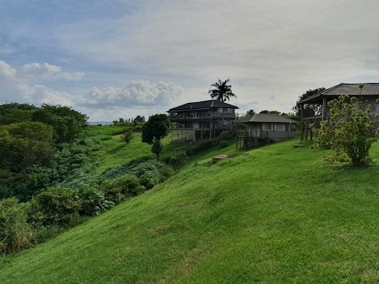 An old house on a green hillside — Jinja, Uganda