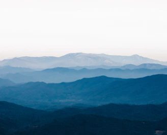 green mountains under white sky during daytime