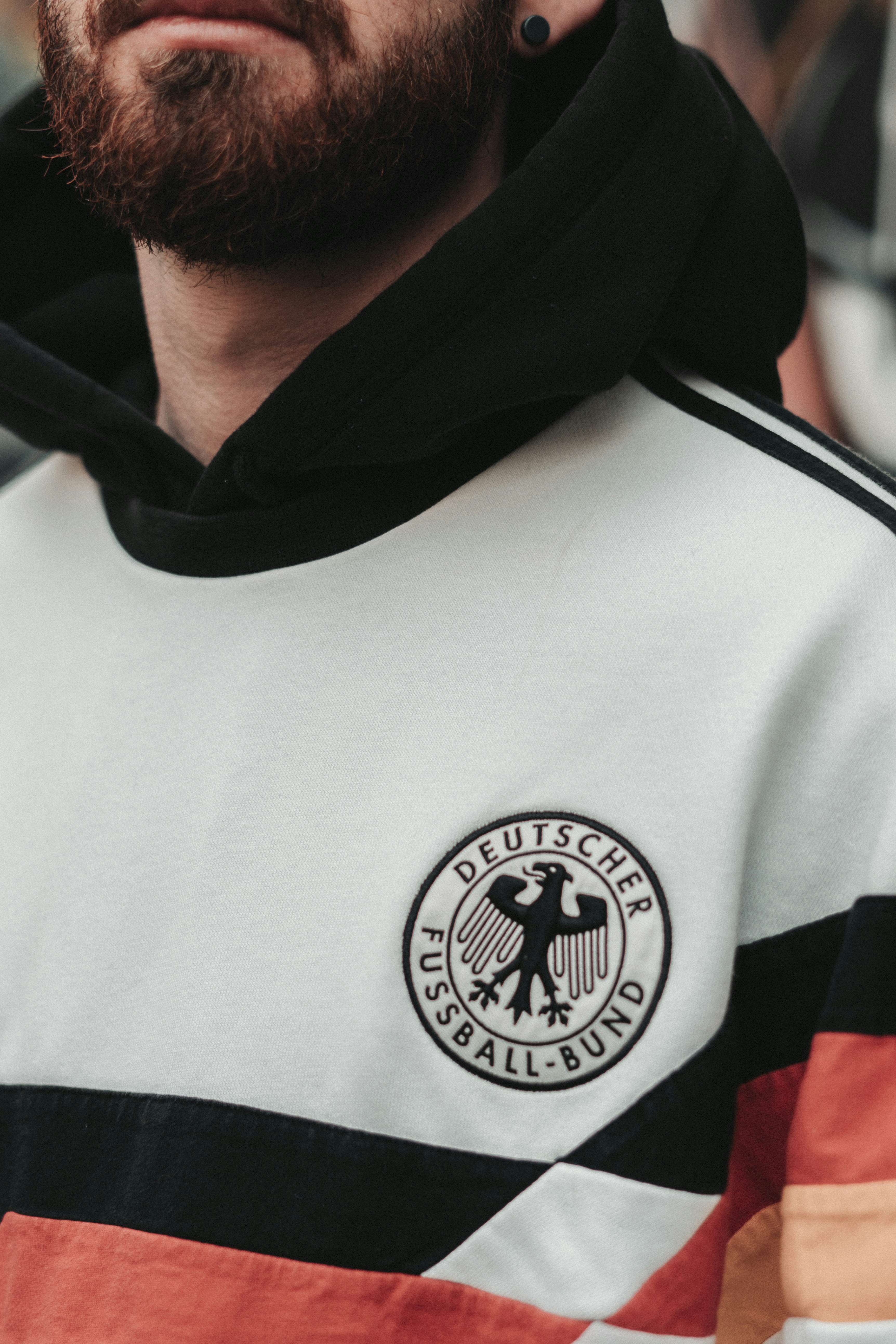 man in white and red hoodie