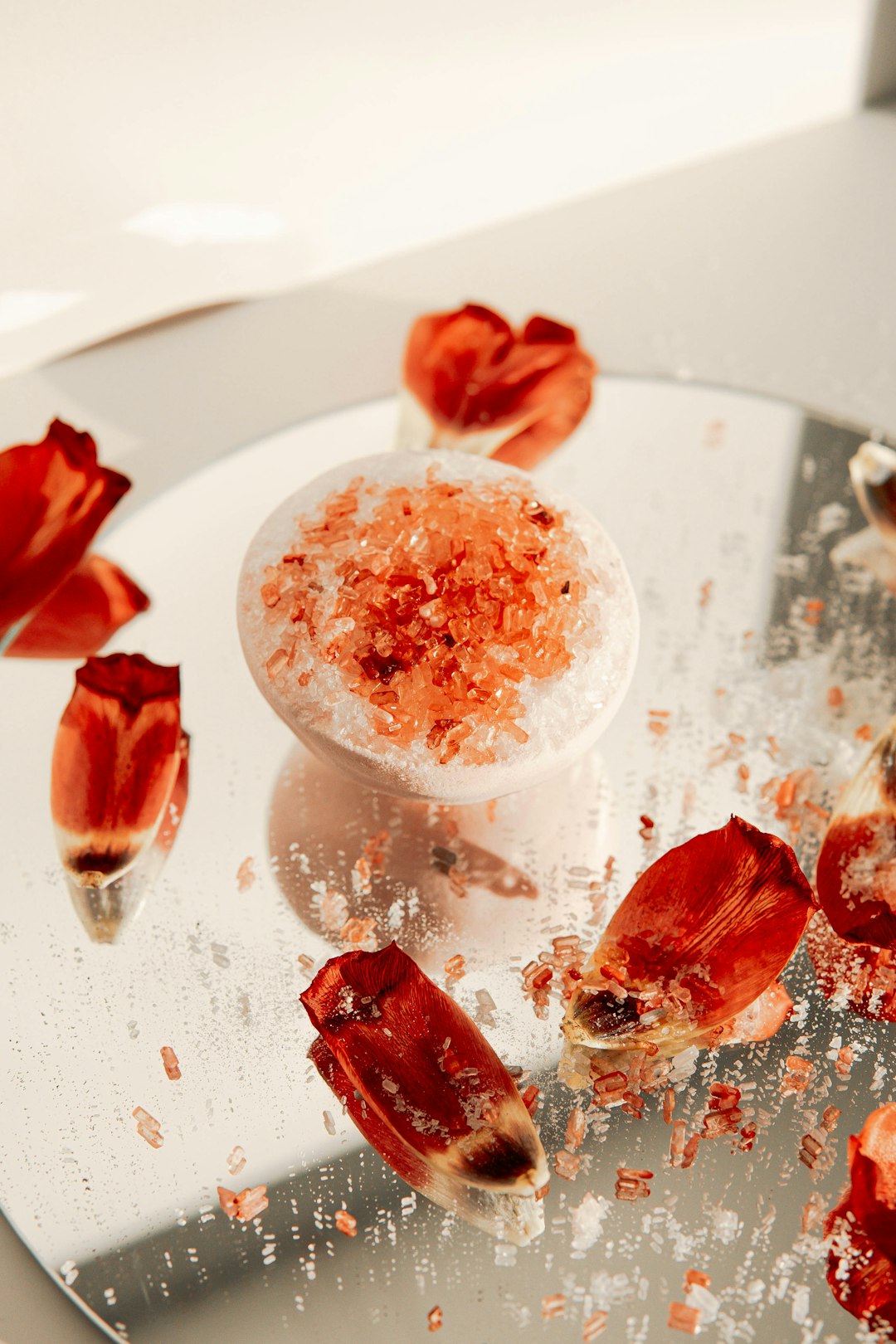 red liquid on clear drinking glass