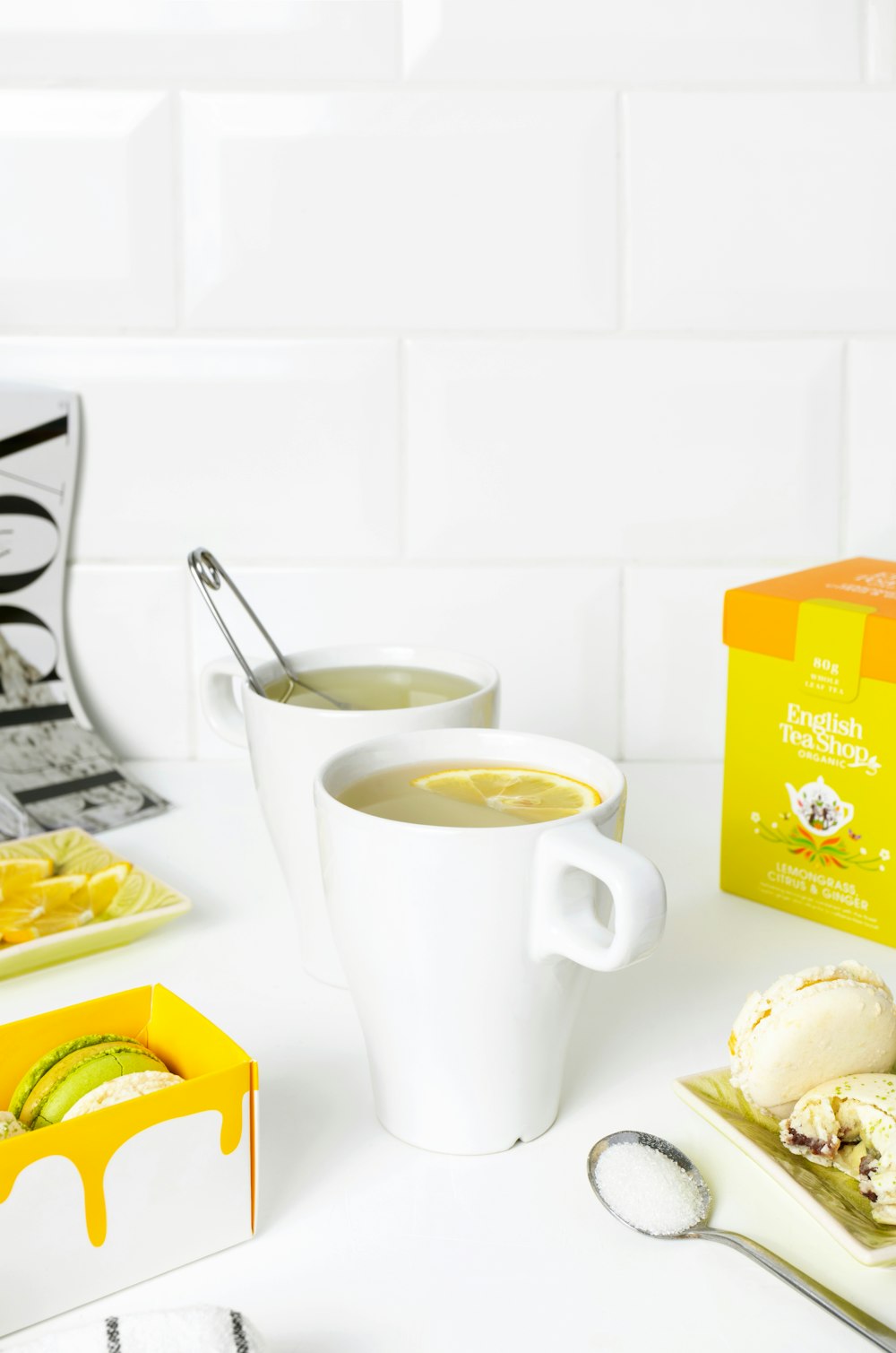 white ceramic mug on yellow and white ceramic plate