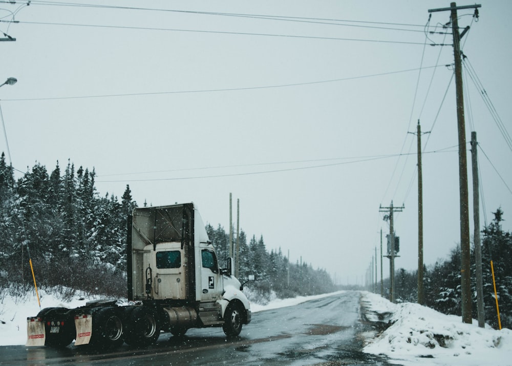 white truck on road during daytime