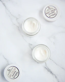white round plastic container on white surface