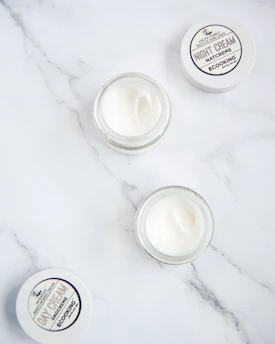 white round plastic container on white surface