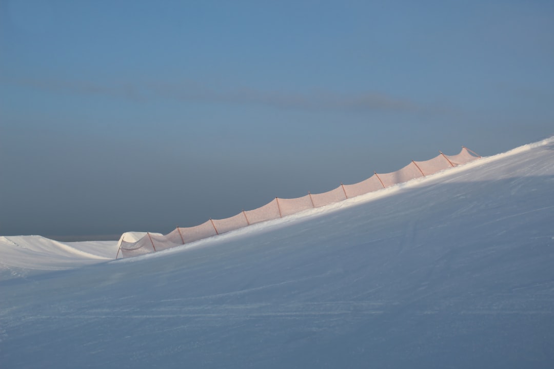 white sand under blue sky during daytime