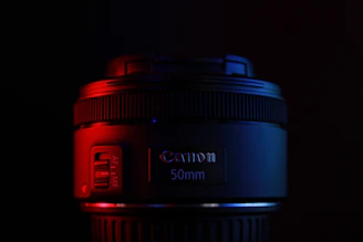 black nikon dslr camera lens