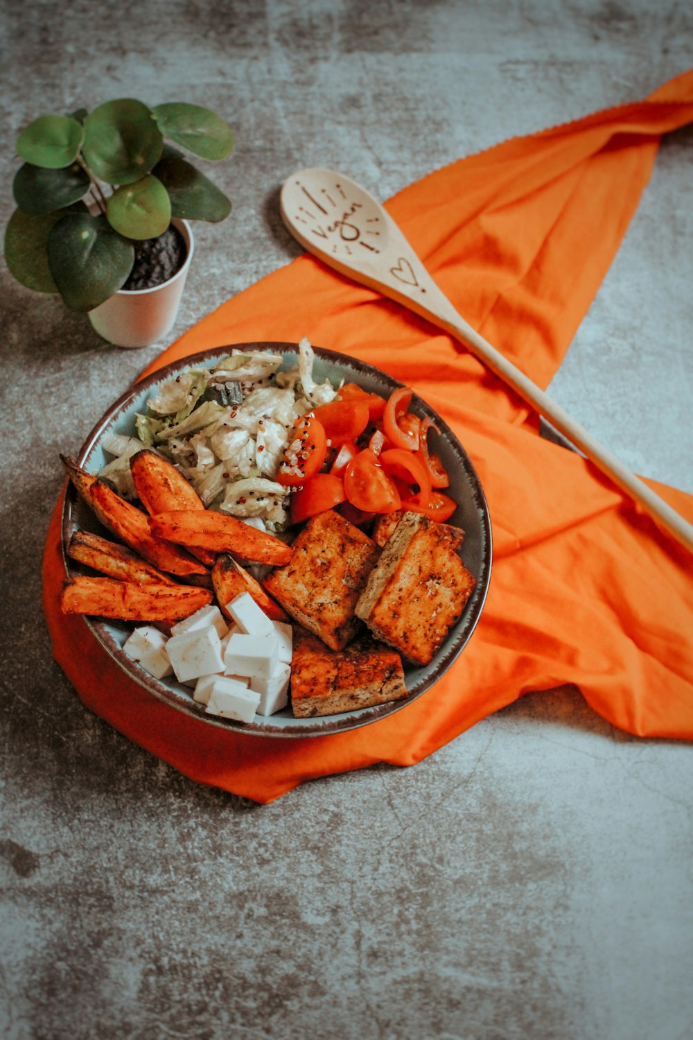 vegetable salad on stainless steel bowl