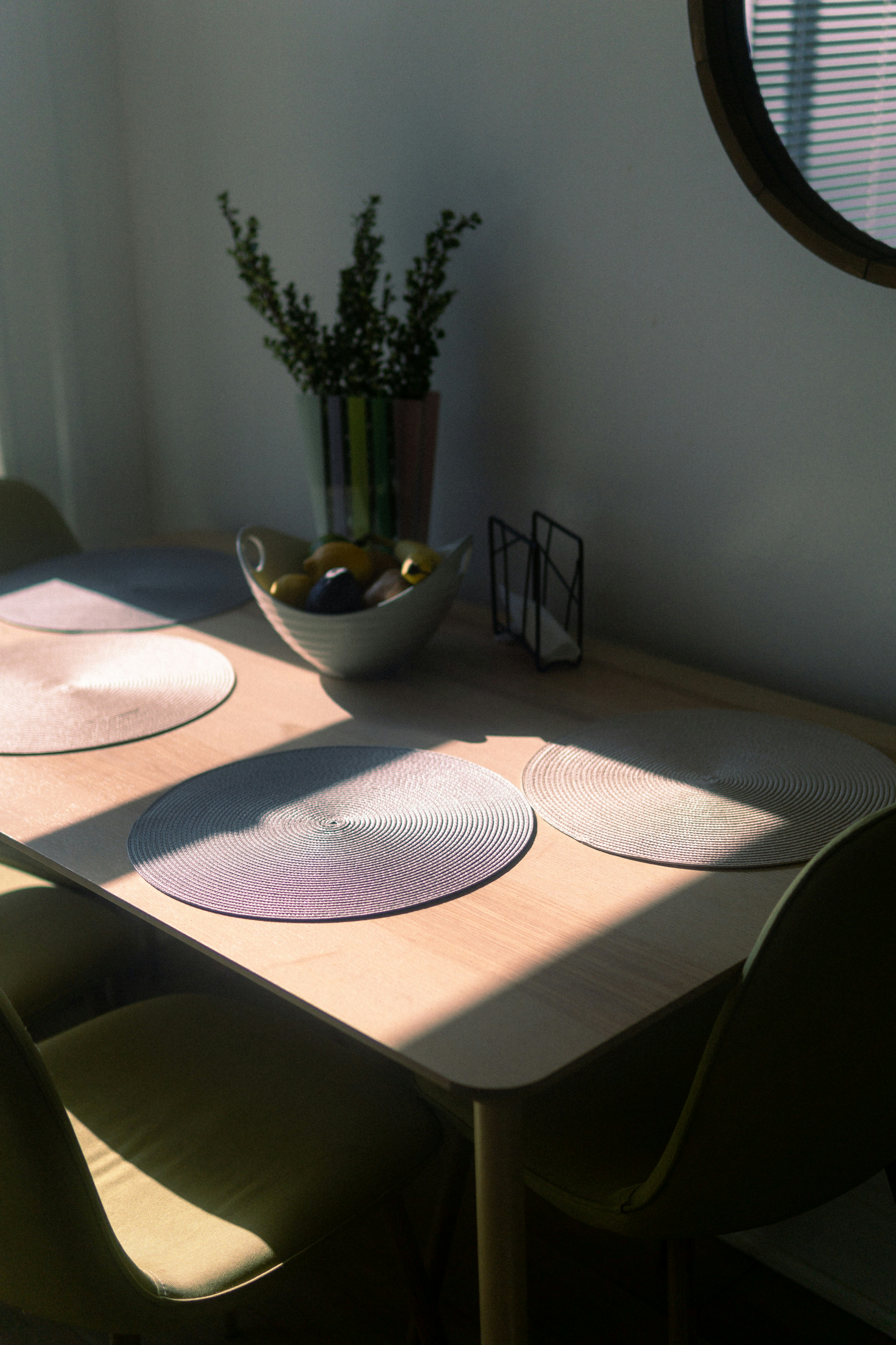 white ceramic bowl on white table cloth