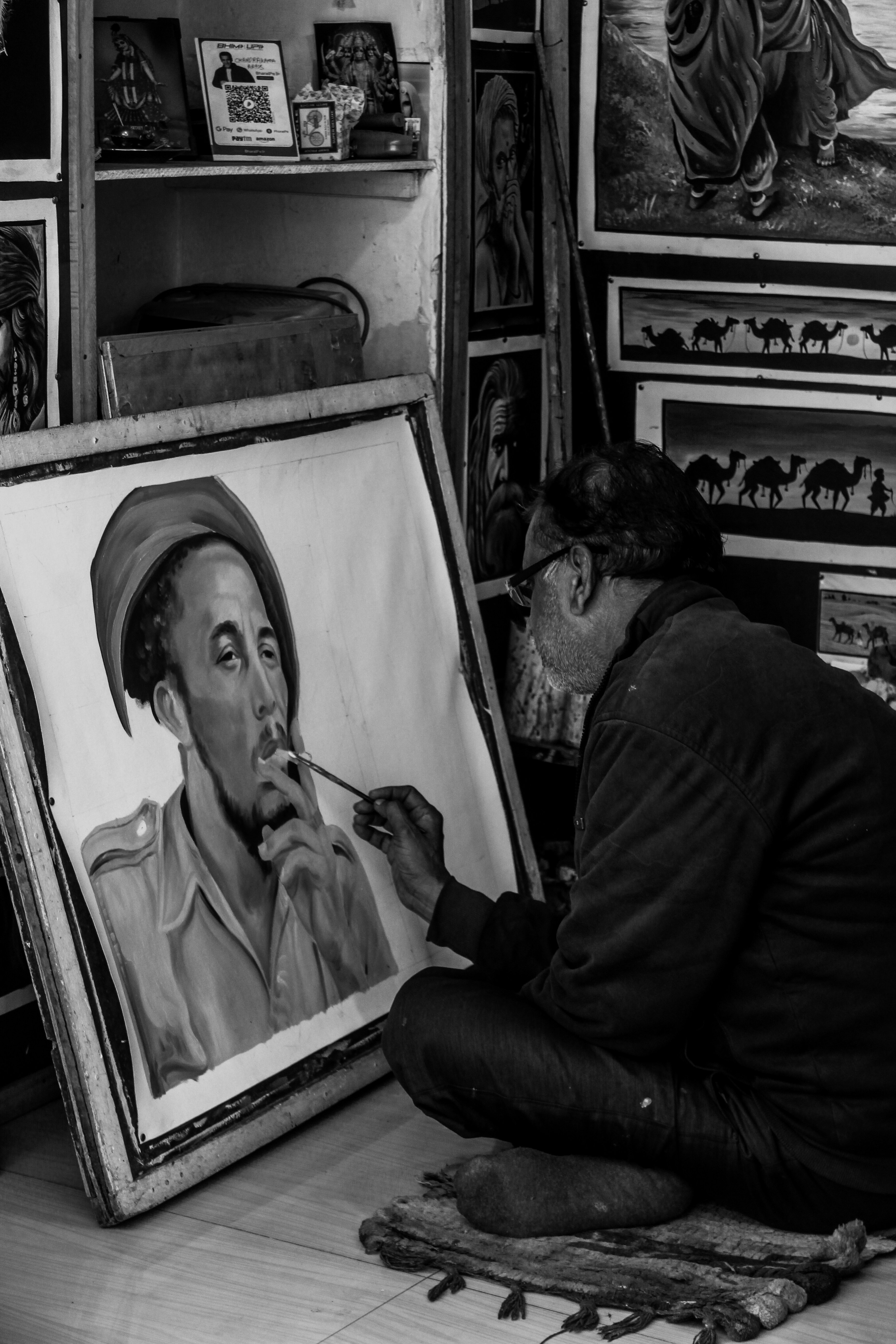 man in black long sleeve shirt smoking cigarette