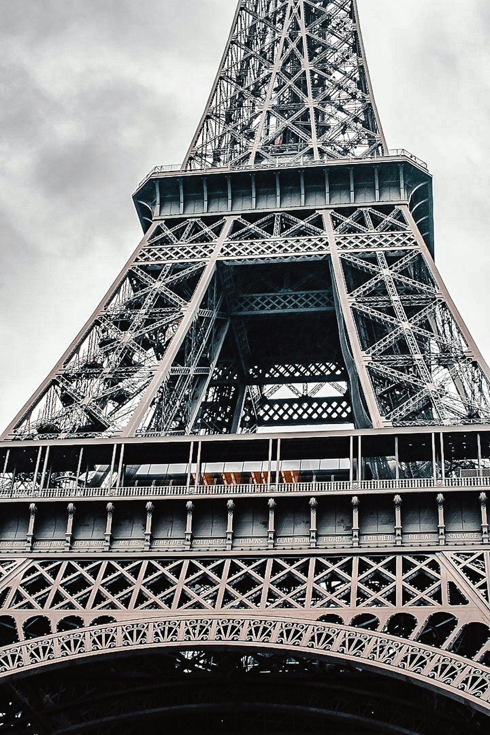 black and white tower under white clouds