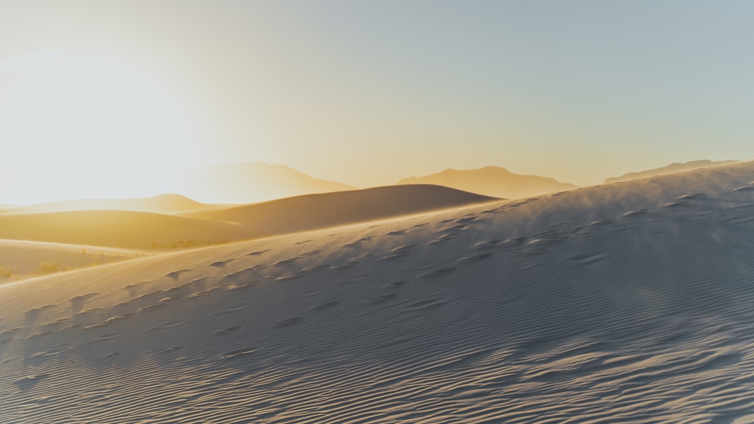 brown sand under blue sky during daytime