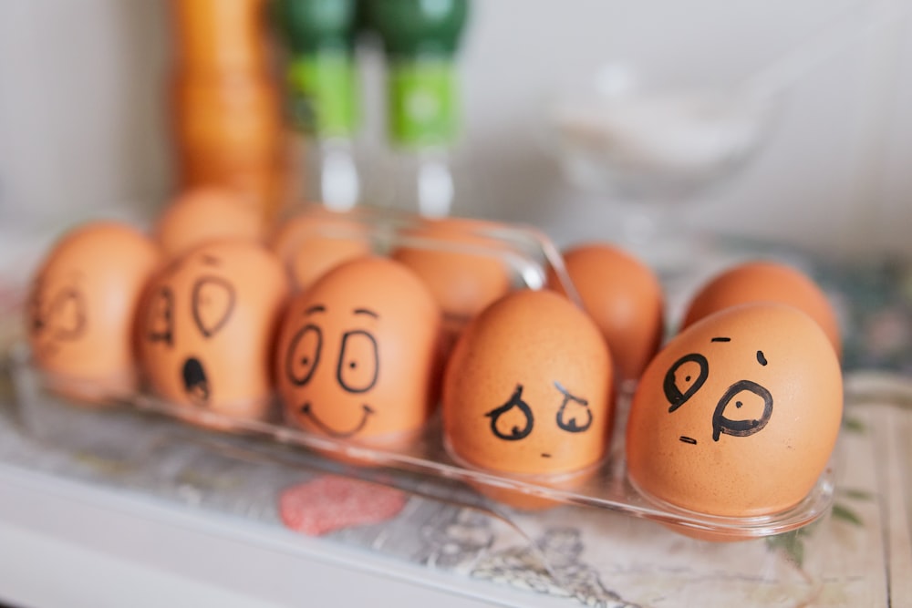 brown eggs on white tray