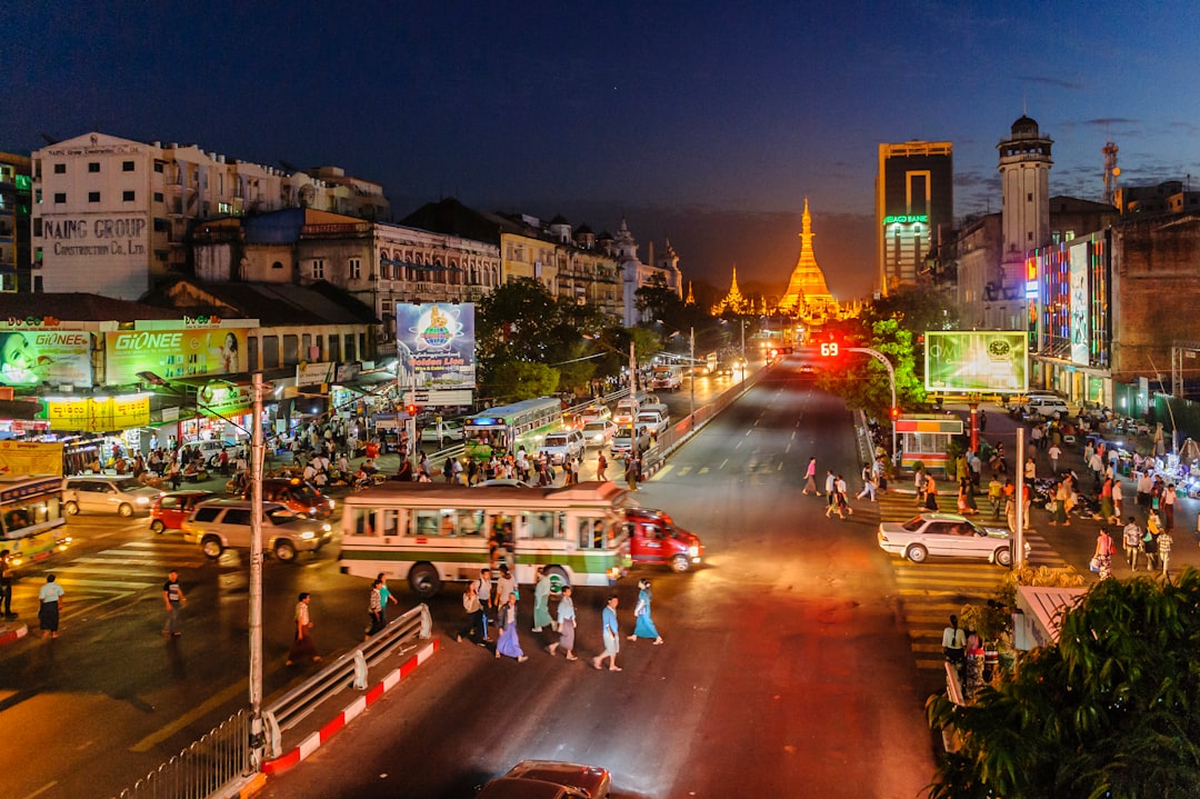 people walking on street during night time