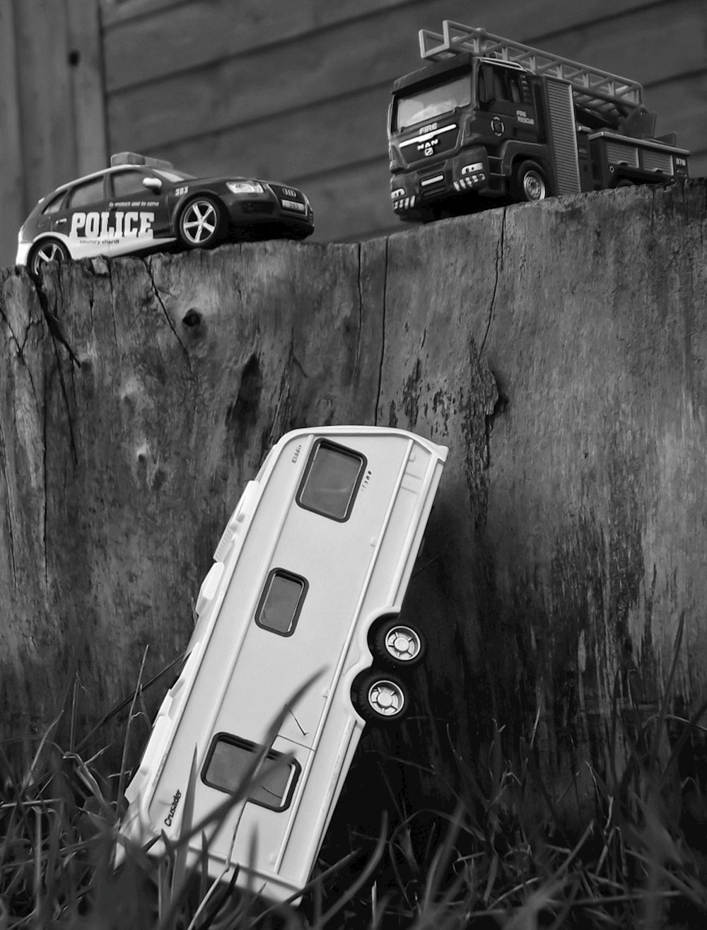 grayscale photo of car on road