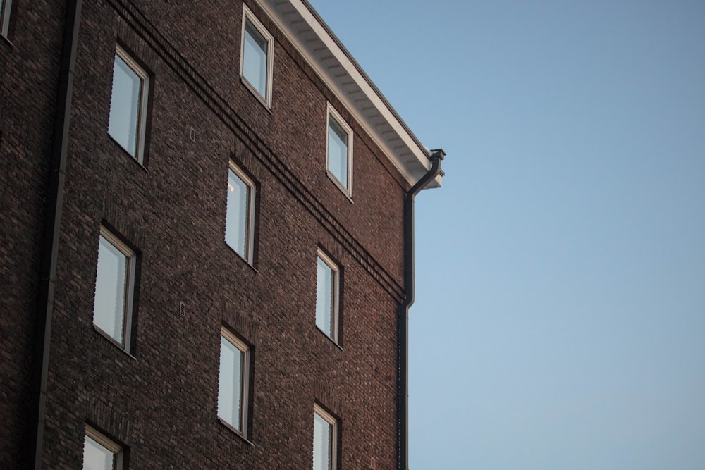 brown concrete building under blue sky during daytime