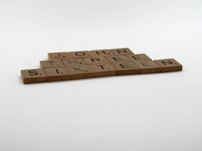 A fun game screen showing the classic hangman setup with Bible-themed words.