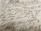 Close-up of an open manuscript featuring elegant Modi script calligraphy on aged paper.