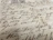 Close-up of an open manuscript featuring elegant Modi script calligraphy on aged paper.