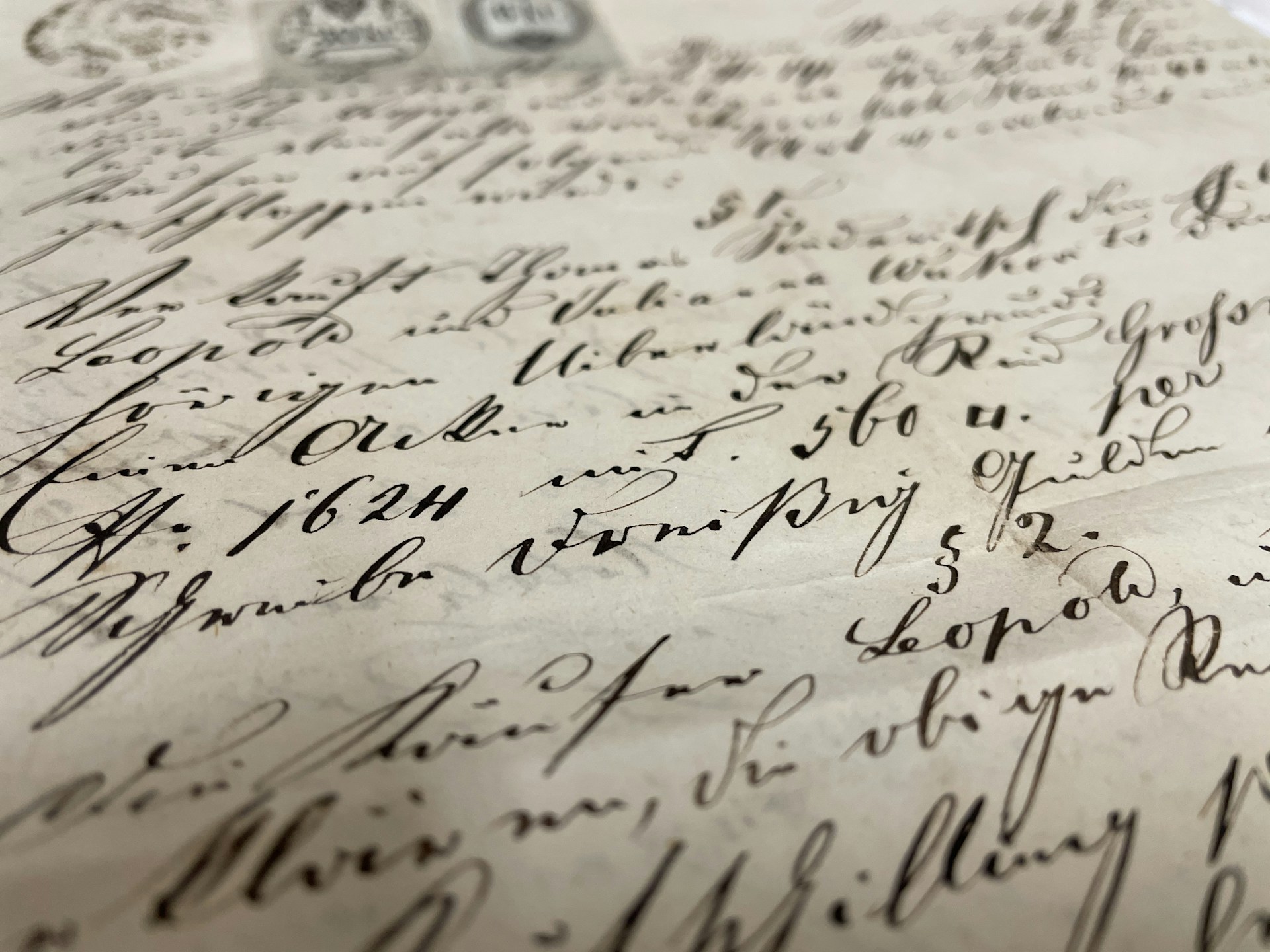 woman wearing yellow long-sleeved dress under white clouds and blue sky during daytime