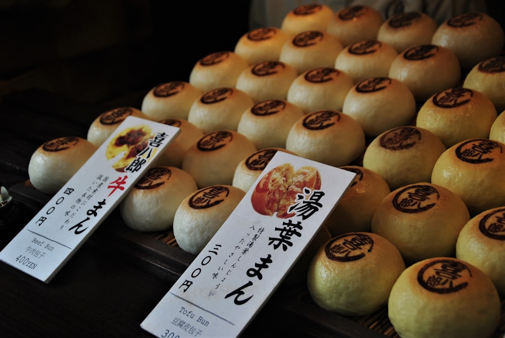 white and brown pastry on display counter