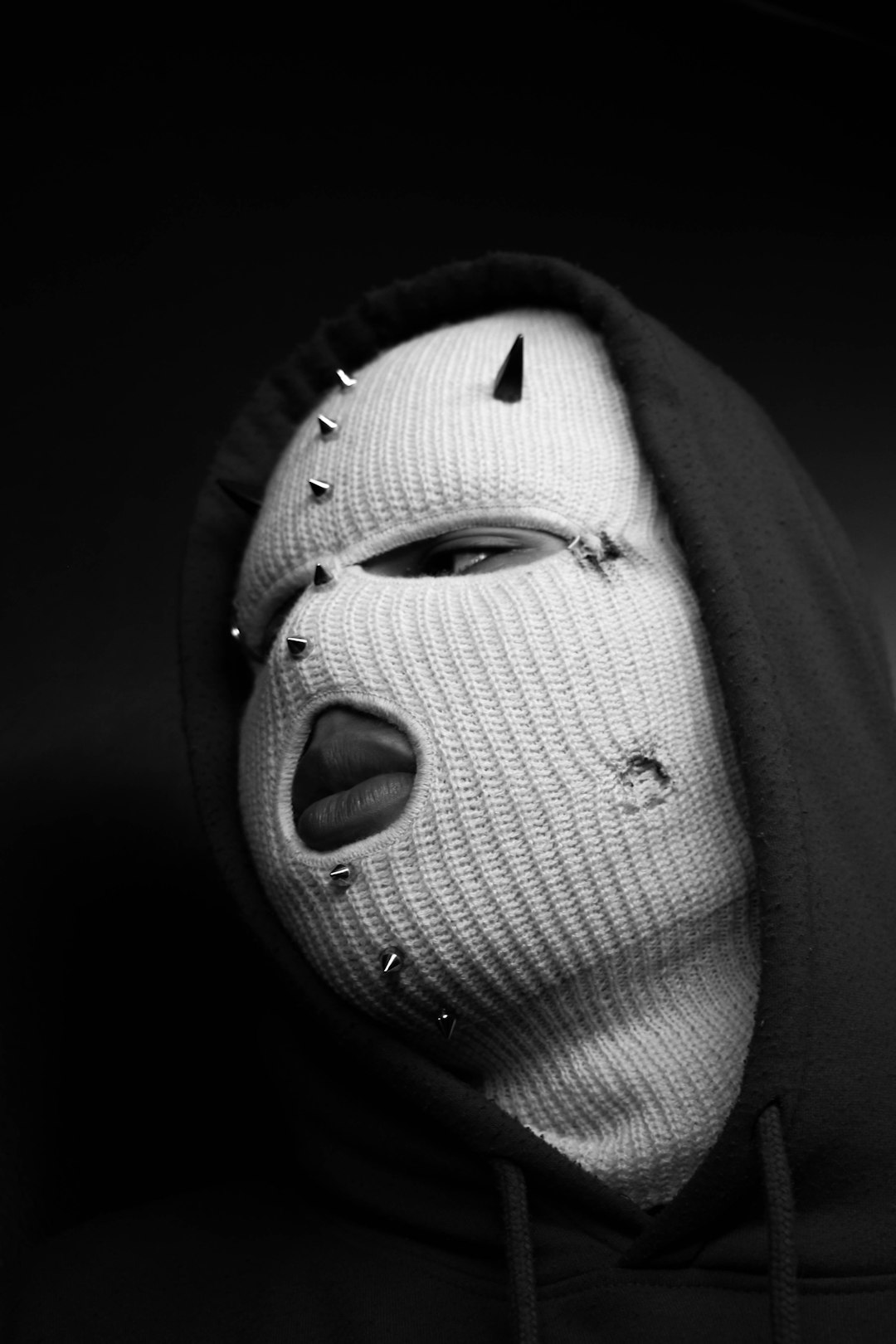 grayscale photo of person wearing mask