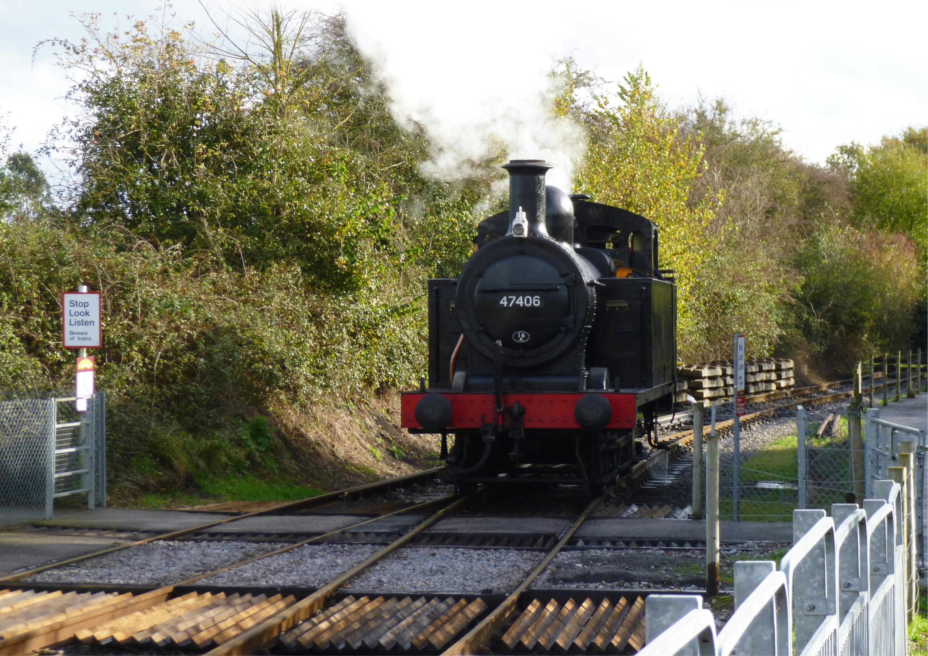 black and red train on rail tracks during daytime, Old steam engine</p><p>