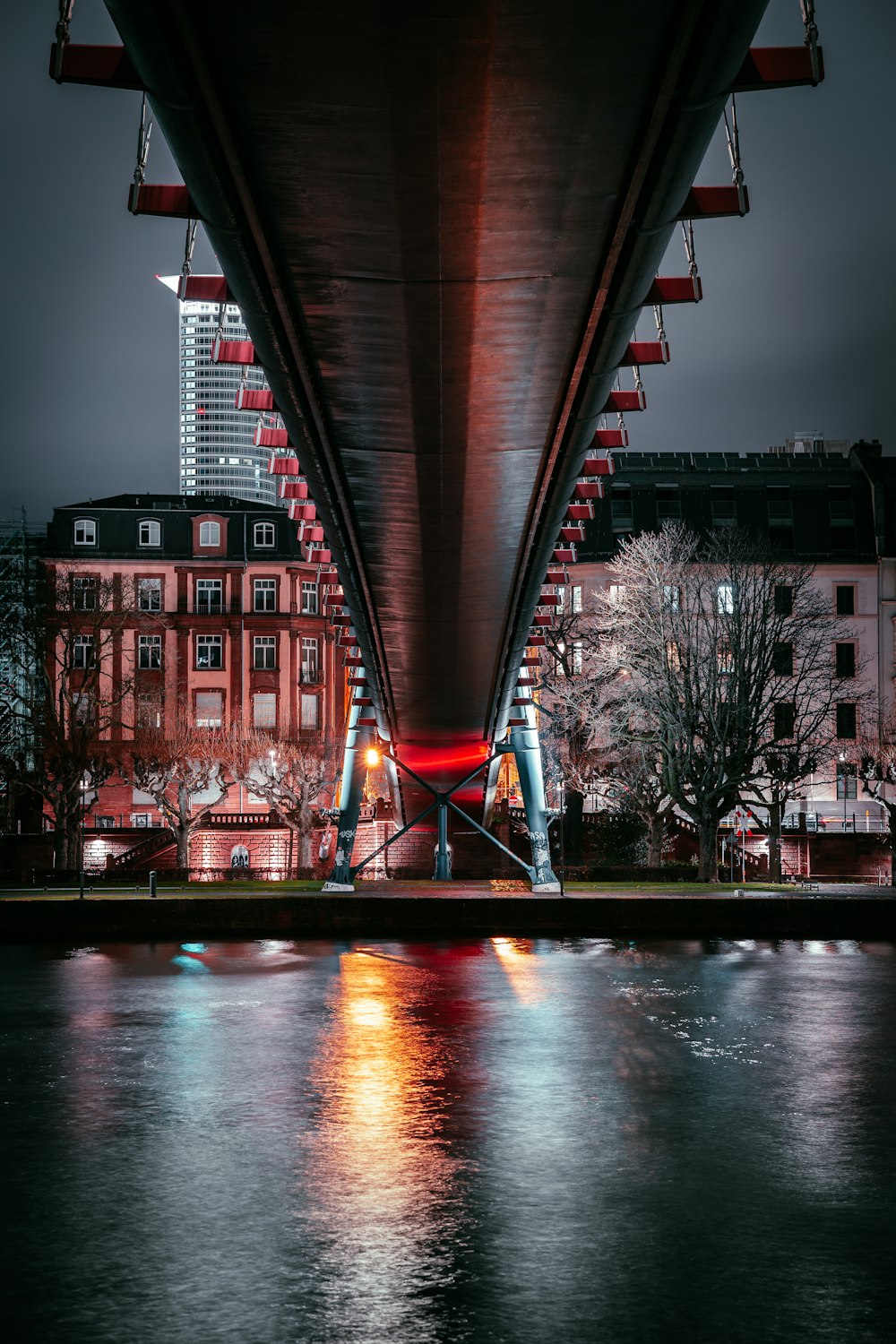 brown concrete bridge during night time