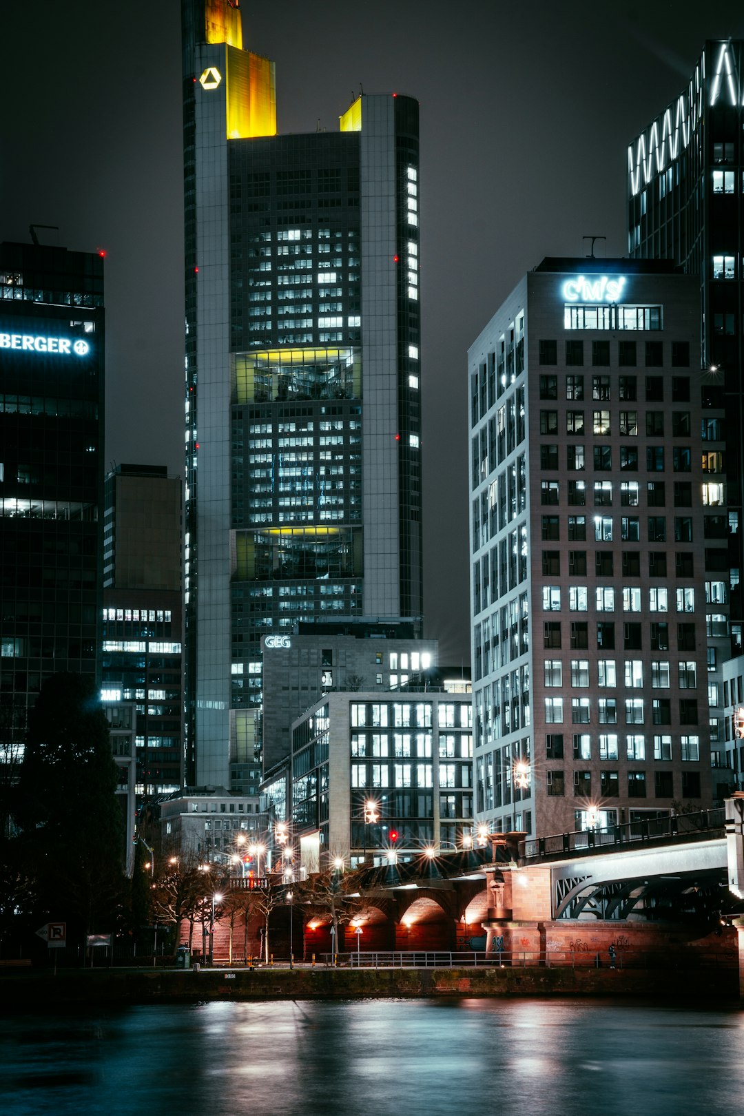 black and white concrete building during night time