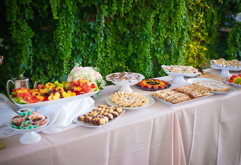 assorted foods on white table