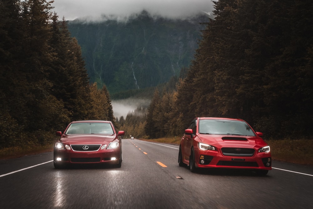 red car on road during daytime