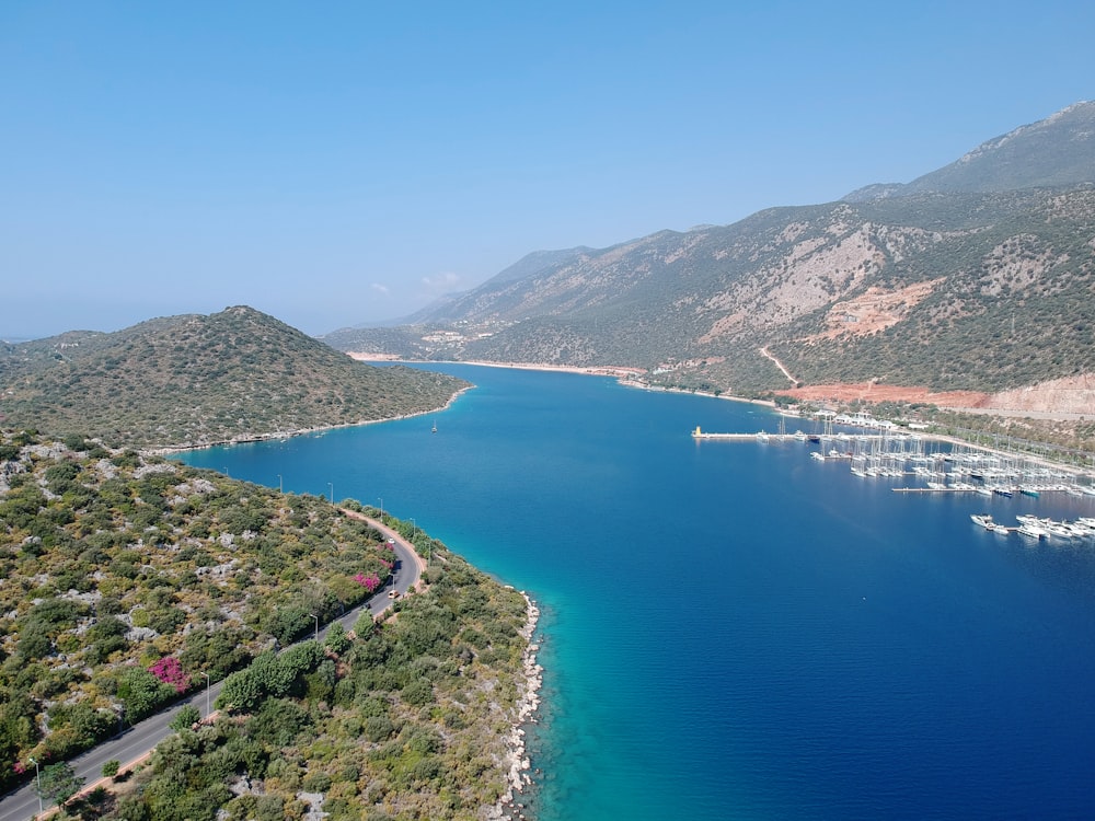 aerial view of green mountains and blue sea during daytime