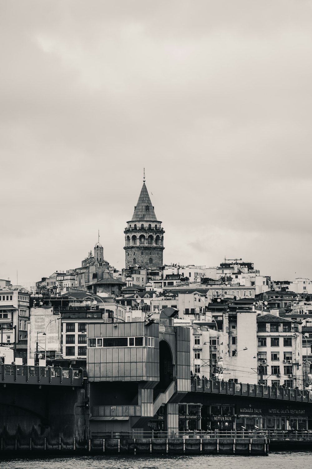 grayscale photo of city buildings