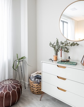 white wooden drawer with mirror