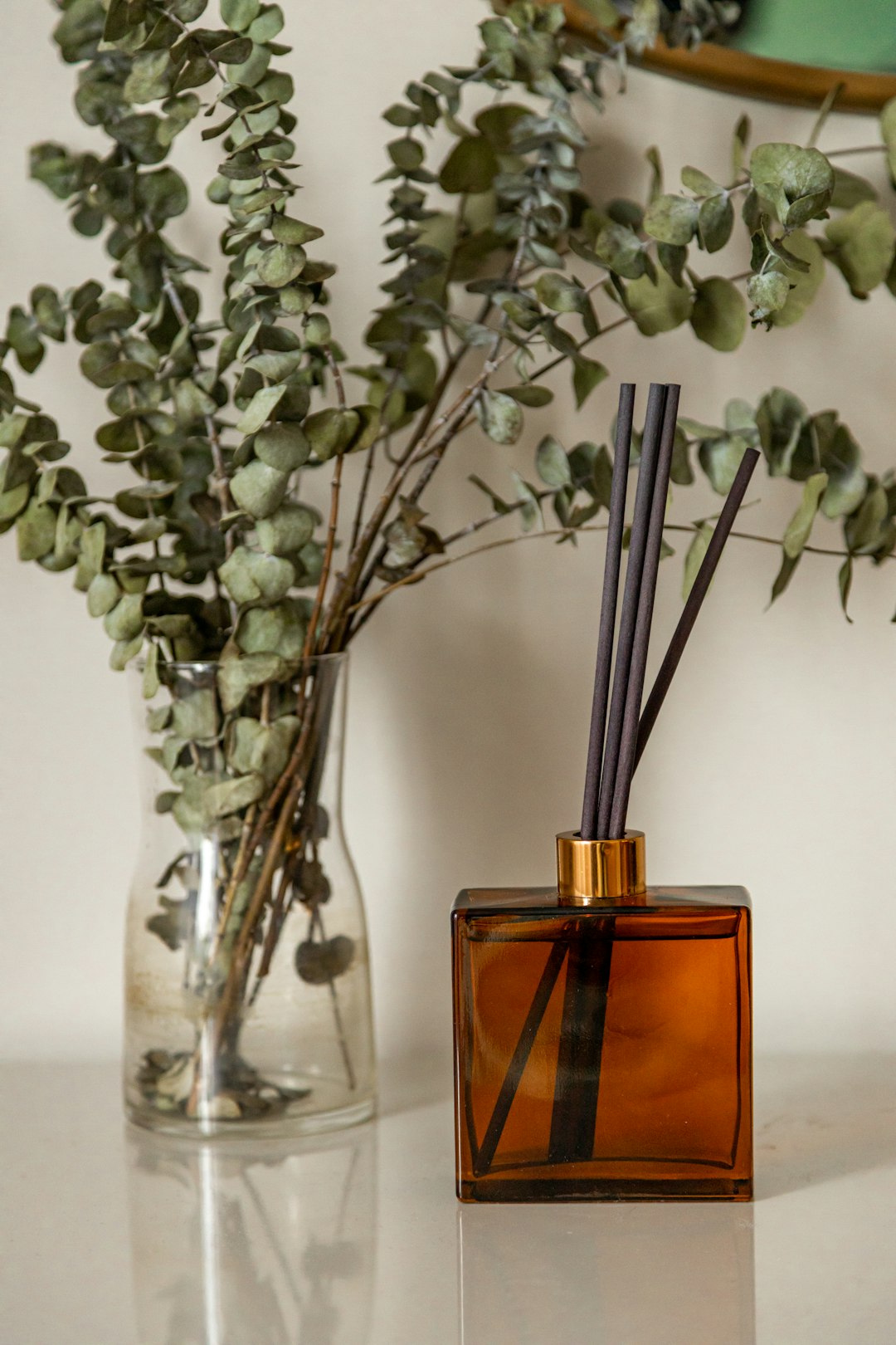  green plant on clear glass bottle wick