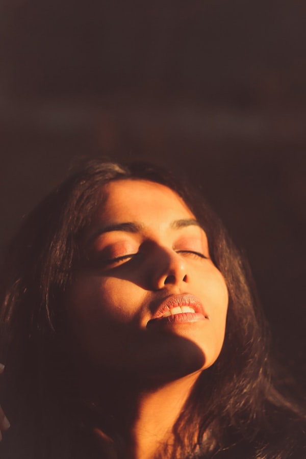 A pregnant woman soaking up the sun, symbolising the importance of Vitamin D during pregnancy.