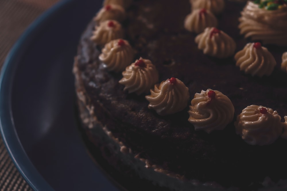 chocolate cupcake with white icing on top