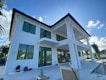 white and blue wooden house under blue sky during daytime