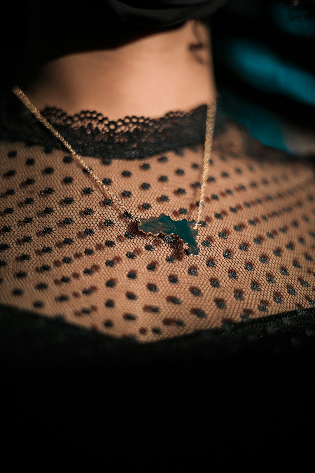 silver necklace with green butterfly pendant