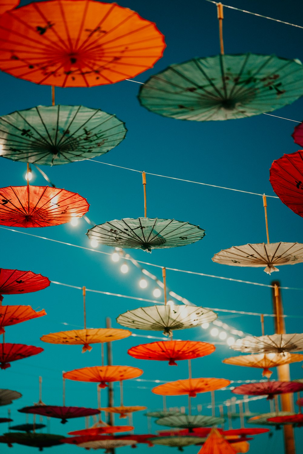 red and white umbrella umbrellas during daytime