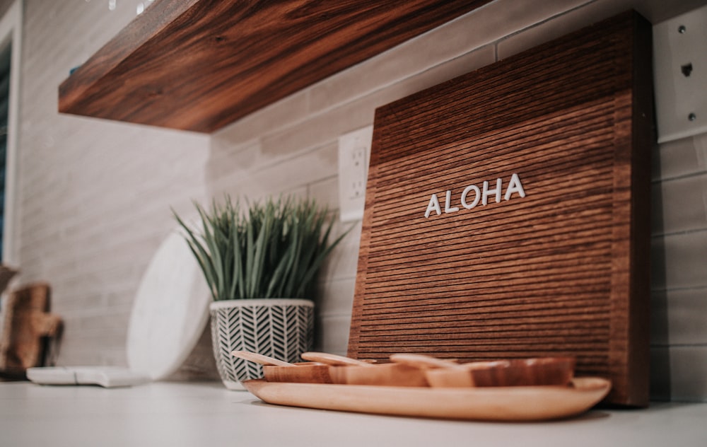 brown wooden board on white table