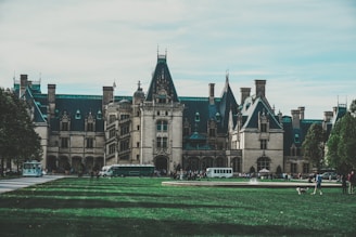 Guests happily walking from their parked cars to an elegant event venue in Worcester.