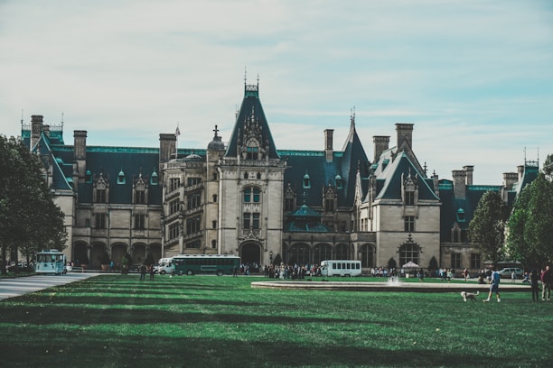 Guests happily walking from their parked cars to an elegant event venue in Worcester.