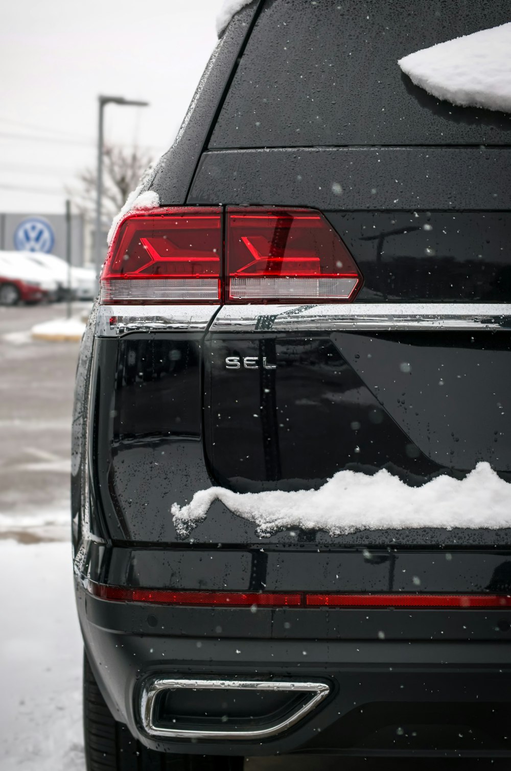 black car with water droplets