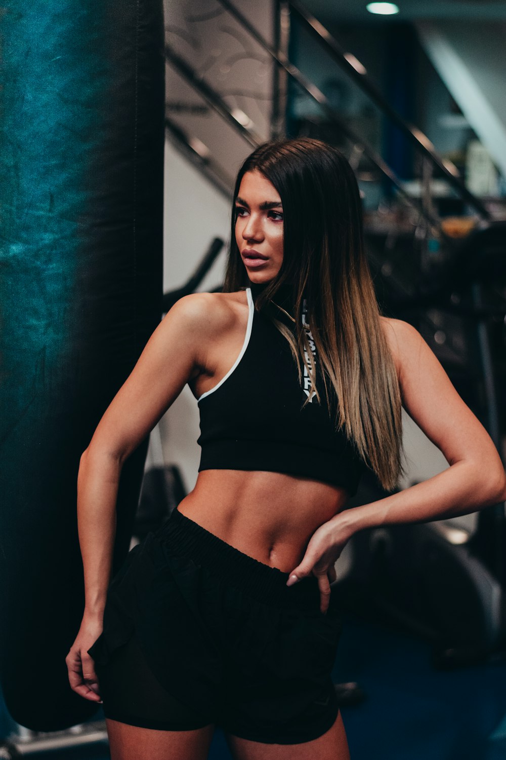 woman in black tank top and black skirt