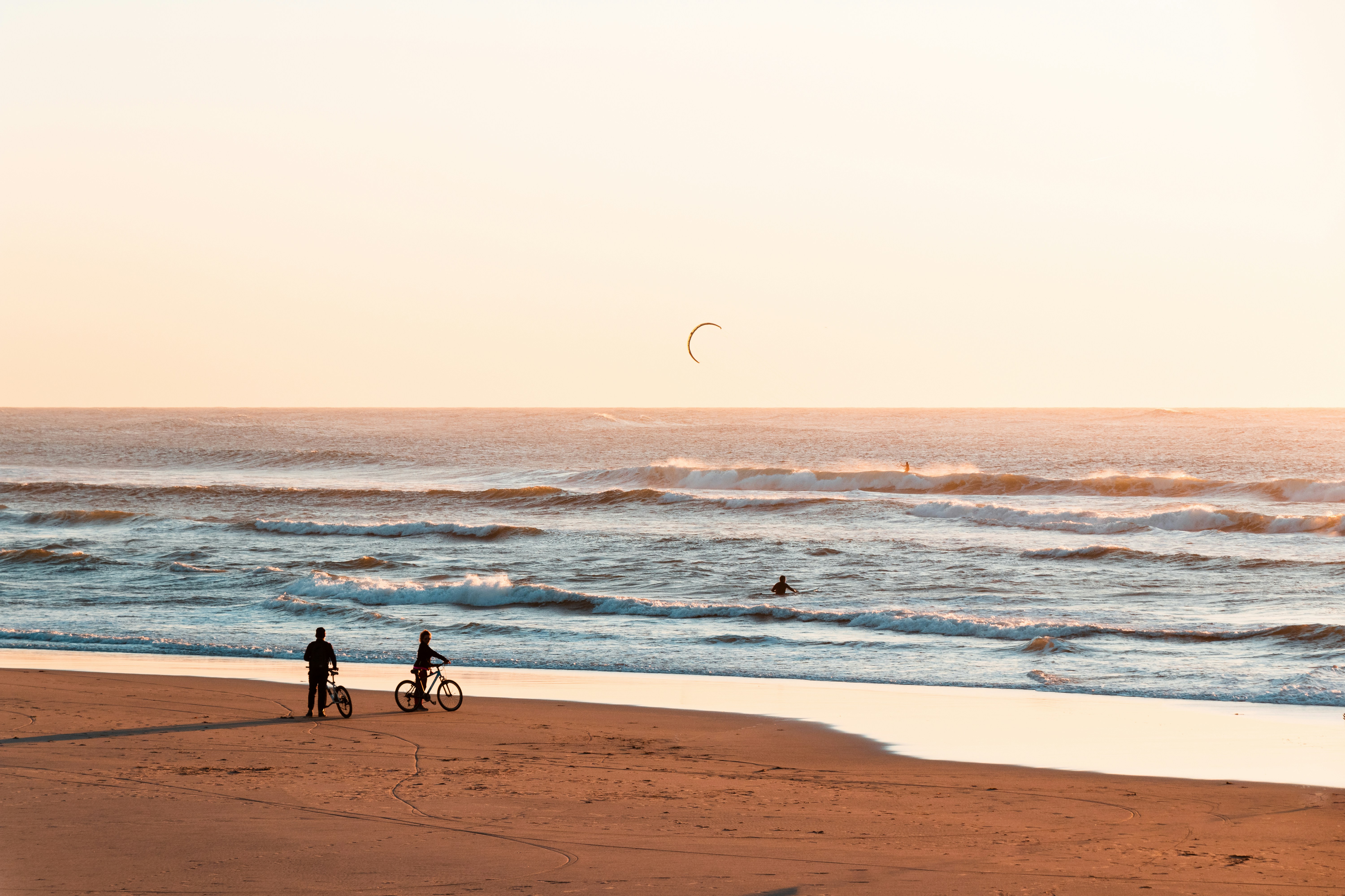people walking on beach during daytime