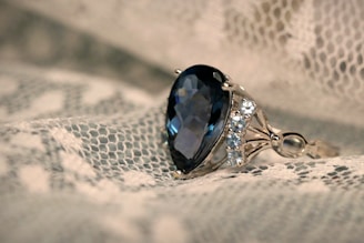 silver and blue gemstone ring