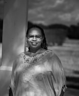 grayscale photo of woman in white dress